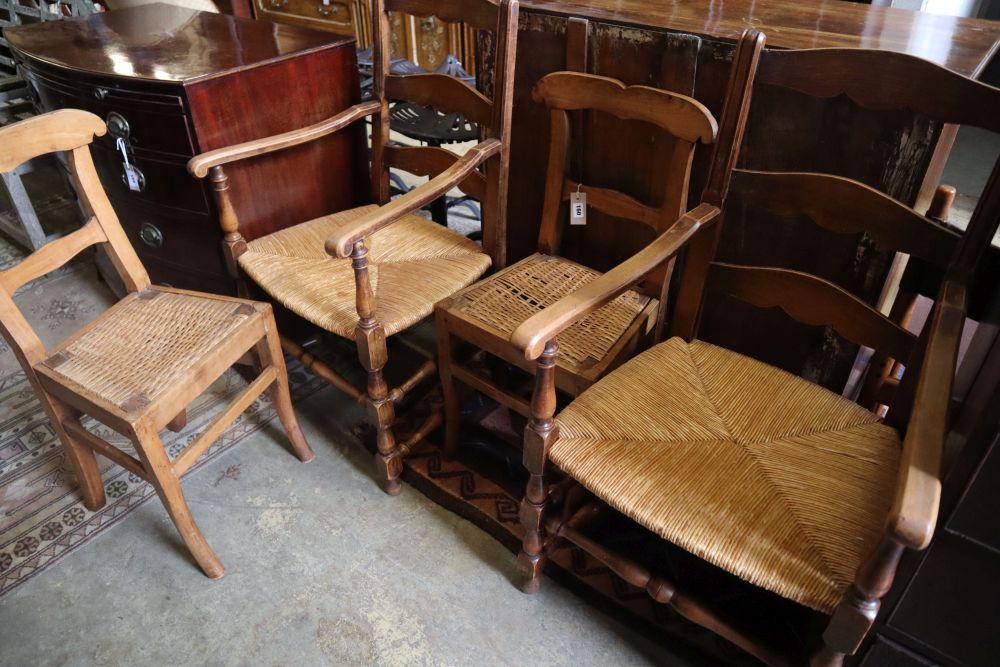 A pair of beech rush seat elbow chairs and a pair of 19th century French fruitwood chairs
